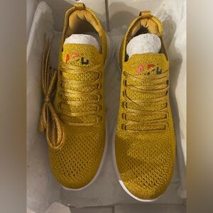 APL Women's Gold Techloom Breeze Sneakers